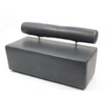 Contemporary two seater settee with grey upholstery, 74cm H x 117cm W x 57cm D.