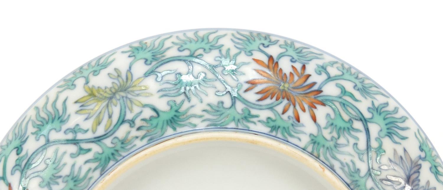 Chinese doucai porcelain dish, hand painted with flowers amongst scrolling foliage, six figure - Image 5 of 6