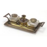 Victorian aesthetic style brass desk stand with two glass inkwells and a chamber stick, 23.5cm