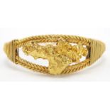 Unmarked gold rope twist and gold nugget bracelet, (tests as 18ct gold+) 6cm in diameter, 40.4g :