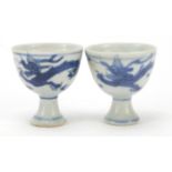 Pair of Chinese blue and white porcelain stem cups from the Hatcher junk with paper labels and