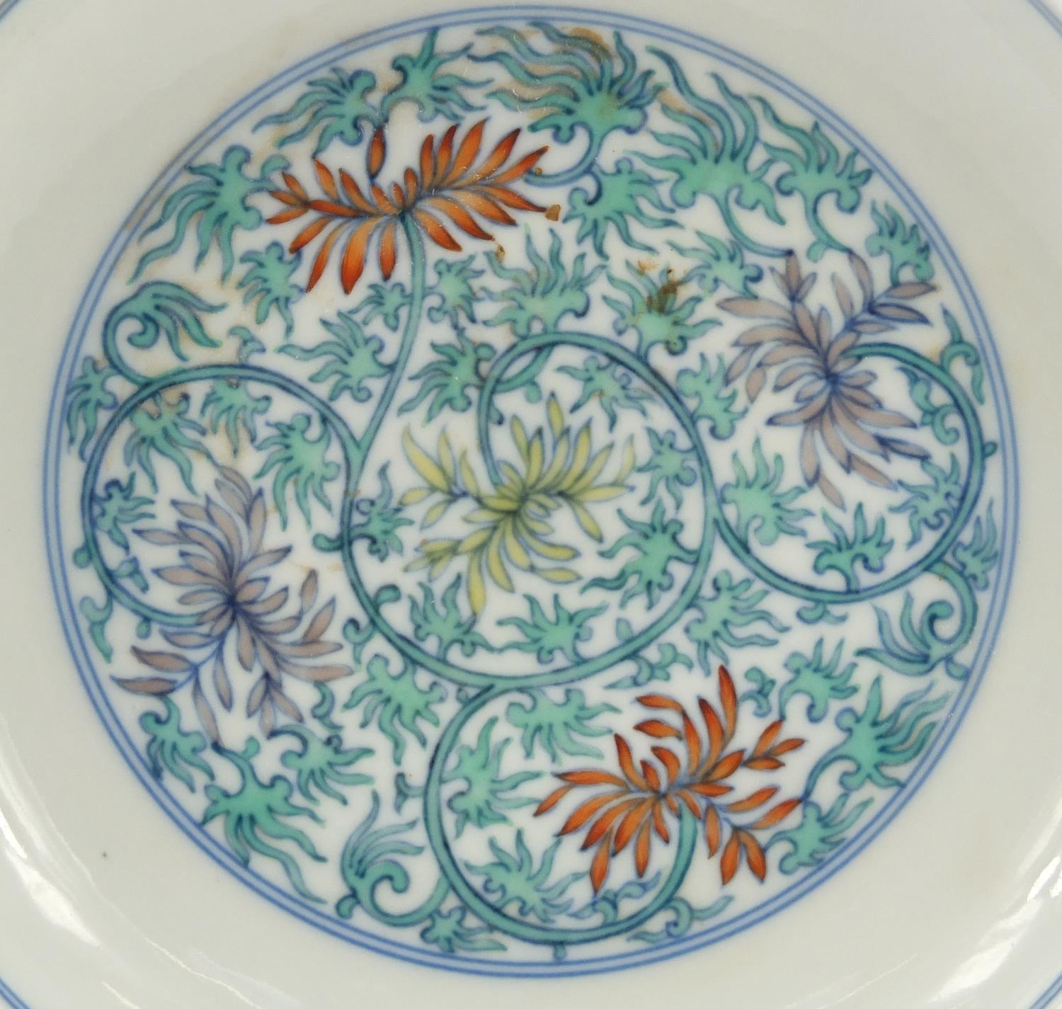 Chinese doucai porcelain dish, hand painted with flowers amongst scrolling foliage, six figure - Image 2 of 6