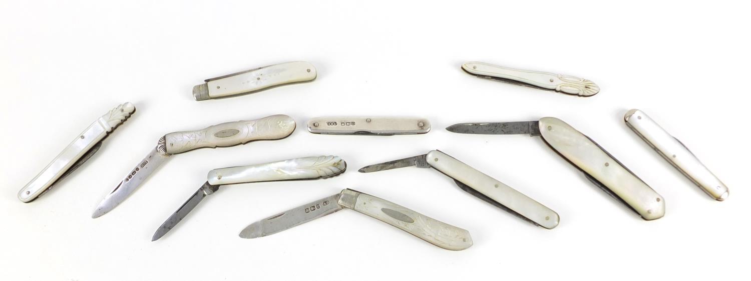 Nine Victorian and later silver and steel bladed mother of pearl flanked folding fruit/pocket knives