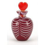 Red cased Art Glass scent bottle with heart design stopper and combed design, 12cm high : For