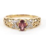 9ct gold garnet and diamond ring with pierced shoulders, size p, 2.2g : For Further Condition