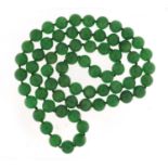 Chinese green jade bead necklace, 82cm in length : For Further Condition Reports Please Visit Our