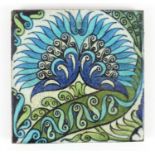 Arts & Crafts pottery tile hand painted in the Iznik manner with flowers, by William de Morgan,