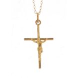 9ct gold crucifix pendant on a 9ct gold necklace, the pendant 3cm in length, 0.8g : For Further