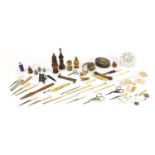 Antique and later objects including ivory whistle, silver thimble, treen needle cases, brass tape