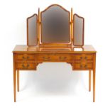 Yew dressing table with five drawers and a folding triple aspect mirror, the dressing table 77cm H x