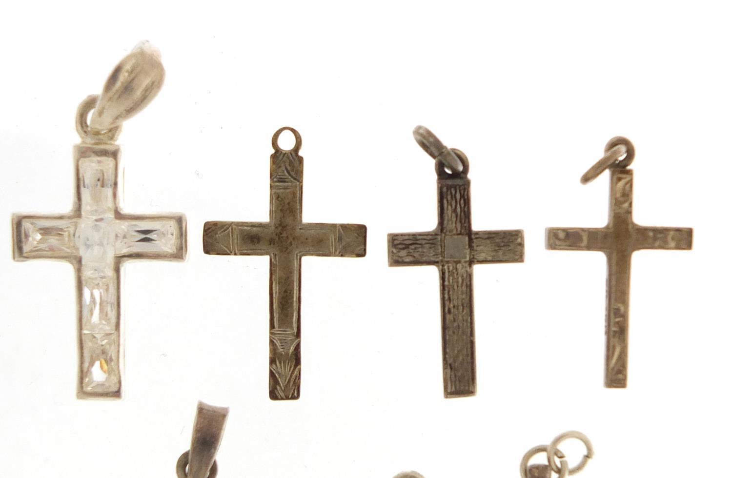 Twenty two silver pendants including crucifixes and love hearts, the largest 5.5cm in length, 39. - Image 3 of 8