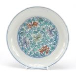 Chinese doucai porcelain dish, hand painted with flowers amongst scrolling foliage, six figure
