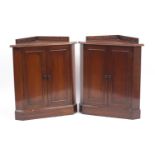 Pair of Edwardian mahogany two door corner cupboards, 85cm H x 75cm W x 52cm D : For Further