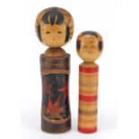 Two Japanese painted wood Kockeshi dolls, the largest 24cm high : For Further Condition Reports