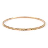 Unmarked gold bangle, (tests as 9ct gold) 6.5cm in diameter, 8.9g : For Further Condition Reports