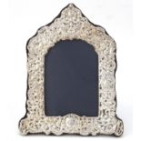 Victorian style silver easel photo frame embossed with vines and blank cartouche, DR & S London