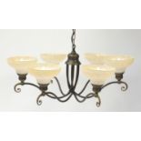 Bronzed six branched light fitting with marbleised glass shades, 73cm in diameter : For Further