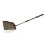 Antique Dutch bronze fire shovel with mask, 83cm in length : For Further Condition Reports Please