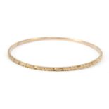 Unmarked gold bangle, (tests as 9ct gold) 6.5cm in diameter, 6.8g : For Further Condition Reports