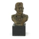 Bronze bust of a World War I Pilot raised on a square black marble base, 13cm high : For Further