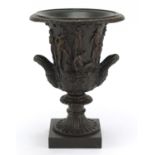 Large patinated bronze classical campana urn with twin handles decorated in relief with classical