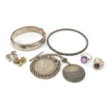 Silver and white metal jewellery and coins including a 1935 rocking horse crown and a Victorian