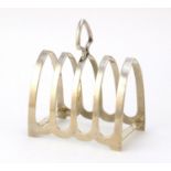 Gothic style four slice toast rack, by Viner's Ltd, Sheffield 1932, 9.5cm in length, 112.2g : For