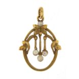Arts and Crafts design unmarked gold seed pearl pendant (tests as 15ct gold) in the style of