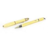 Sterling silver and yellow guilloche enamel fountain pen and pencil, the fountain pen with 14ct gold