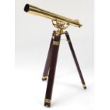 Floor standing brass telescope with mahogany tripod stand : For Further Condition Reports Please