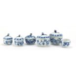 Five Meissen sugar bowls with floral knopped lids and a open sugar bowl, each hand painted with