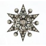 Good Victorian unmarked diamond starburst brooch pendant, set with fifty solitaire diamonds, 4.5cm