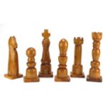 Six oversized carved wood chess pieces, the largest 38cm high : For Further Condition Reports Please