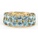 9ct gold two row blue topaz half eternity ring, size N, 3.7g : For Further Condition Reports