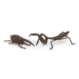 Two Japanese patinated bronze insects comprising praying mantis and Hercules beetle, the largest 7.