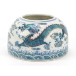 Chinese doucai porcelain brush pot, hand painted with a dragon amongst clouds chasing a flaming