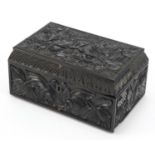 Anglo Indian Ceylonese ebony casket profusely carved with flowers, 11.5cm H x 24cm W x 15.5cm D :