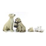 Model animals including a group of dogs lantern and a stoneware frog, the largest 39cm high : For