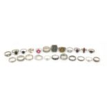 Twenty three silver rings, some set with semi precious stones, various sizes, 82.2g : For Further