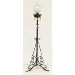 Victorian wrought iron adjustable floor standing oil lamp, (converted to electric use) 140cm