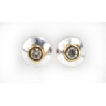 Pair of 9ct gold diamond solitaire earrings, 7mm in diameter, 1.1g : For Further Condition Reports