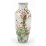 Chinese porcelain vase, finely hand painted in the famille rose palette with birds, butterflies