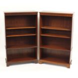 Pair of mahogany open bookcases, fitted with three adjustable shelves, 140cm H x 85cm W x 33cm D :