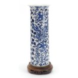 Chinese blue and white porcelain sleeve vase raised on carved hardwood stand, the vase hand
