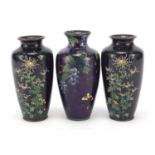 Three Japanese cloisonné vases including a pair enamelled with blossoming flowers, the largest