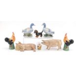 Porcelain animals including two pigs and a Goebel dog, the largest 20cm in length : For Further