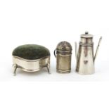 Silver items including a novelty pin cushion and a miniature chocolate powder shaker, various