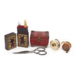 19th century sewing items comprising a tooled leather needle case in the form of a tea caddy,