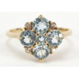 9ct gold blue and clear stone cluster ring, size R, 2.6g : For Further Condition Reports Please