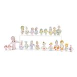 Twenty two Victorian and later hand painted porcelain half pin dolls, the largest 10cm high : For